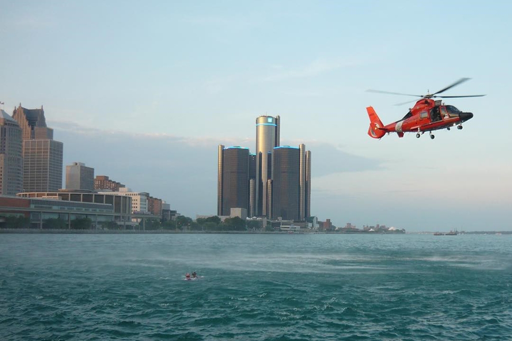 23 of 31 - Detroit, MICHIGAN - uscgHoisting in the #detroitriver, with #detroit and the Rennaissance Center in the background. #uscg #airstationdetroit #greatlakes