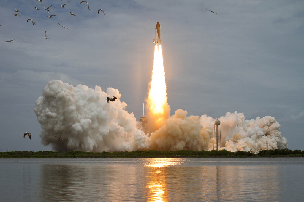 22 of 26 (USA on the Move) - Space shuttle Atlantis is seen as it launches from pad 39A on Friday, July 8, 2011, at NASA's Kennedy Space Center in Cape Canaveral, Fla. Photo Credit: (NASA/Bill Ingalls)